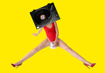 Sexy woman with DJ vinyl record player instead of head on color background