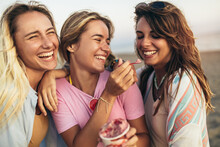 Summer Holidays And Vacation - Girls Eating Ice Cream On The Beach
