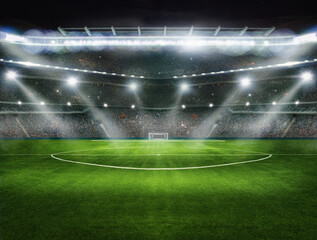 Wall Mural - sport background - big green field in soccer stadium. ready for game