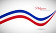 © Akshay - Happy independence day of Philippines. Creative shiny wavy flag background with text typography.