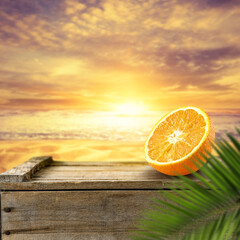 Wall Mural - Fresh orange fruit on desk and summer beach landscape 