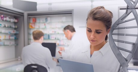 Canvas Print - Double helix over a pharmacist with drugstore in the background, healthcare and medicine concepts