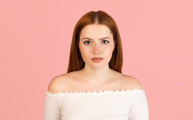 Caucasian woman's portrait isolated over pink studio background with copyspace for ad. Concept of beauty, health.