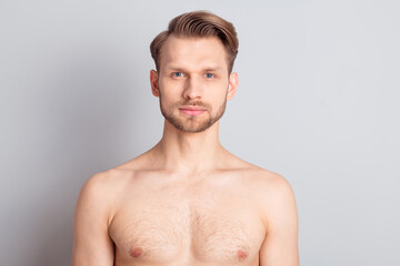 Photo of adorable sweet young blond hair gentleman wear nothing isolated grey color background