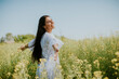 © BGStock72 - Young woman in the rapeseed field
