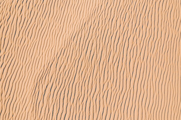 Wind wave vortices in sand background from aerial top view