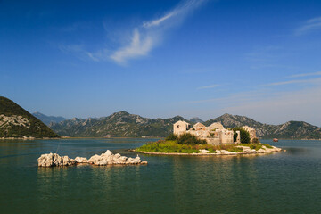 A beautiful view at Grmozur Fortress ruin at the island Grmozur in Lake Skadar National Park in Montenegro, famous tourist attraction.