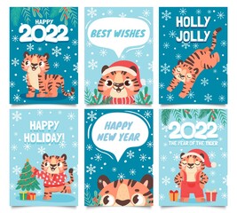 Wall Mural - New year 2022 cards. Merry christmas poster with cartoon tiger decorate tree. Baby tigers in santa hat. Happy holidays greeting vector set