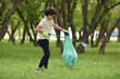 © Daniel CHETRONI - Recycle waste litter rubbish garbage trash junk clean training. Nature cleaning, volunteer ecology green concept. Young men and boys pick up spring forest at sunset. Environment plastic pollution