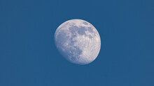 Closeup Of Waxing Gibbous Moon During Daytime Against Clear Blus Sky - Stuttgart, Germany May 23, 2021