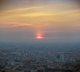 Bangkok city skyline at melacholic lonely misty sunset view from Baiyok ii Tower