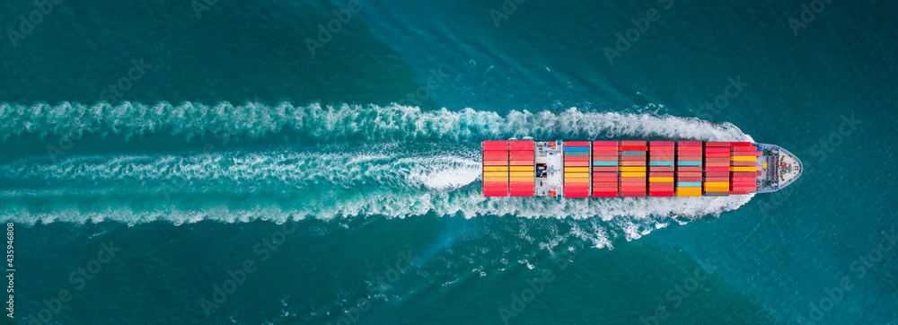 Aerial top view of cargo ship with contrail in the ocean sea ship carrying container and running for export from container international port to custom ocean concept freight shipping by ship service - obrazy, fototapety, plakaty 