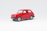 Fototapeta  - Maluch samochód zabawka koloru czerwonego stojący bokiem na białym tle 