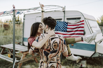 Beautiful Spanish couple enjoying their time during picnic on the US Independence day