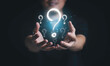 © Dilok - Man holding virtual question mark  for question and answer , Problem solving and solution concept.