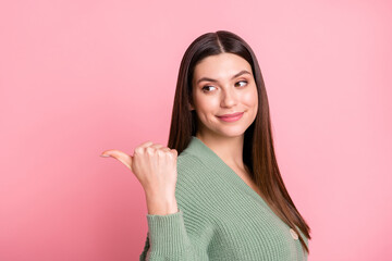 Wall Mural - Profile photo of optimistic girl look point back empty space wear sweater isolated on pink color background