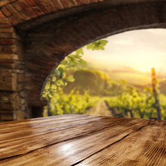Wall Mural - Desk of free space and vineyard background 