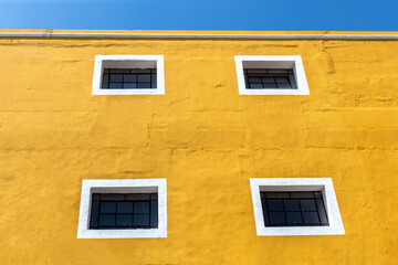 Wall Mural - Mexico, Colorful Puebla streets and colonial architecture in Zocalo historic city center.