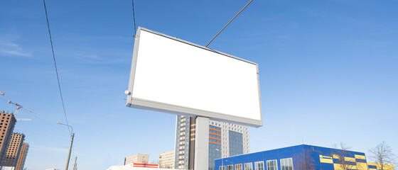 Billboard against the sky. Mockup for advertising