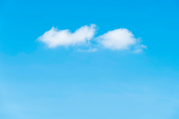 Wall Mural - White and smooth cloud on blue sky background with copy space.