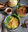 © ysk1 - Homemade traditional Peranakan Malaysian cuisine / Nasi Kunyit aka Turmeric Glutinous Rice / Delicious dish eaten with dry curry chicken with glutinous rice cooked in coconut milk and turmeric
