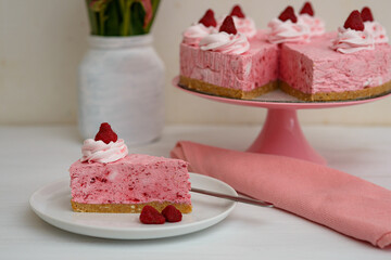 Sticker - Piece of raspberry cheesecake on a white plate