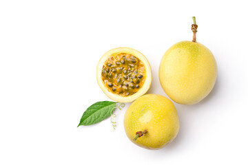 Wall Mural - Flat lay of Yellow  passion fruit with cut in half and green leaf isolated on white background..