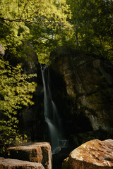 Poster - Beautiful shot of a waterfall in rocks