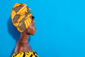 Poster - Profile photo of pretty dark skin lady look concentrated empty space isolated on blue color background