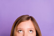 Cropped photo of young little girl look empty space information advert amazed isolated over violet color background