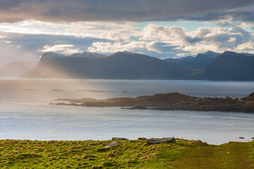 Canvas Print - View at a rocky coast in Norway at dawn