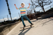 USA, California, Big Sur, Boy Skateboarding In Skate Park