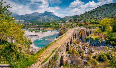 Wall Mural - attractive spring view of old mes bridge. majestic morning landscape of shkoder. wonderful outdoor s