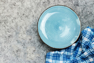 Sticker - Empty plate and napkin on wooden table