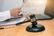 © aekachai - Judge gavel with Justice lawyers having team Concepts of Law and Legal services