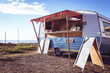 © Wavebreak Media - General view of food truck by seaside on sunny day