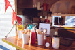 © Wavebreak Media - Close up view of food truck with condiments and red bunting