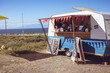 © Wavebreak Media - General view of food truck with red bunting by seaside on sunny day