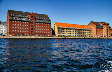 beautiful buildings along canal tour in copenhagen