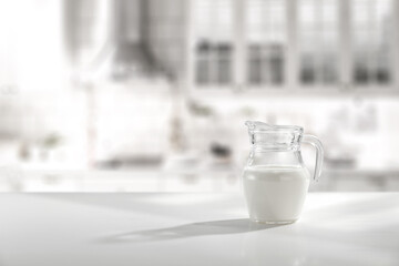 Sticker - Glass of fresh milk and kitchen interior 