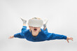 © somemeans - Boy flies in virtual reality glasses. White background. Virtual reality games