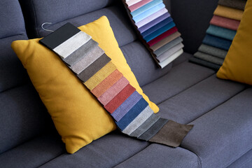 Wall Mural - Colorful upholstery fabric samples on the sofa