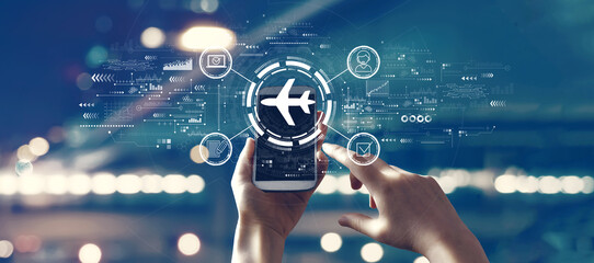 Wall Mural - flight ticket booking concept with person using smartphone