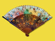 antique elegant Spanish silk folding fan hand painted with artistic colorful floral designs.
