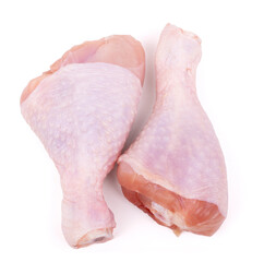 Two raw chicken drumsticks isolated on white background