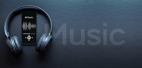 Music concept. Audio beats, sound headphones, music application on mobile smartphone screen. Record sound voice on dark background. Recording studio or podcasting banner with copy space.