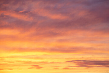 Colorful sunset with clouds in the sky.