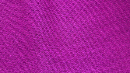 Wall Mural - photography of pink woolen fabric texture background. bright violet clothing background. pink texture with blank space for design.