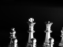 Grayscale Shot Of Chess Pieces Isolated On Black Background