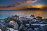 Fototapeta  - Skały nad morzem Adriatyckim w Grecji o wschodzie słońca